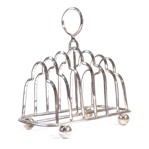 627 - An Edwardian silver 7-bar toast rack, by the Alexander Clark Manufacturing Co, hallmarks Birmingham ... 