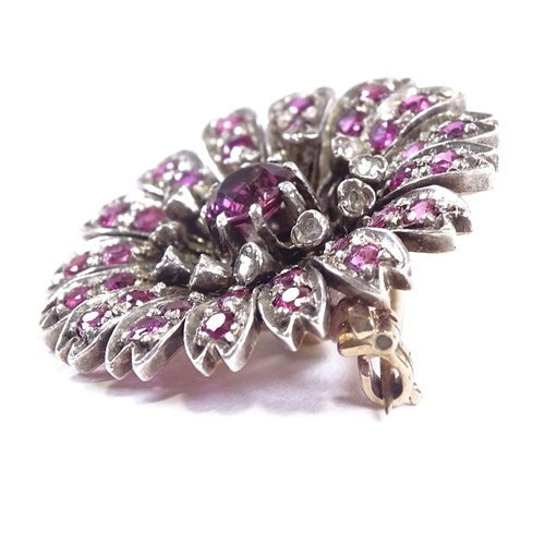 629 - A Victorian unmarked gold ruby and diamond cluster flowerhead brooch, brooch diameter 26.2mm, 8.7g