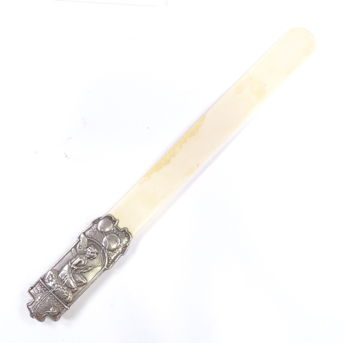 636 - An Edwardian Art Nouveau silver-handled ivory page turner, relief embossed fairy design, by Deakin &... 