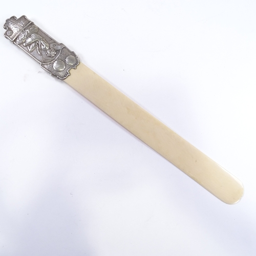 636 - An Edwardian Art Nouveau silver-handled ivory page turner, relief embossed fairy design, by Deakin &... 