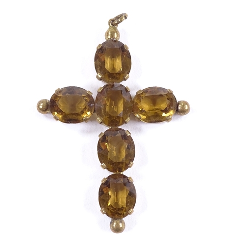 644 - A gilt-metal brown paste cruciform pendant, gilt-metal settings, unmarked, pendant height 58.8mm, 7.... 