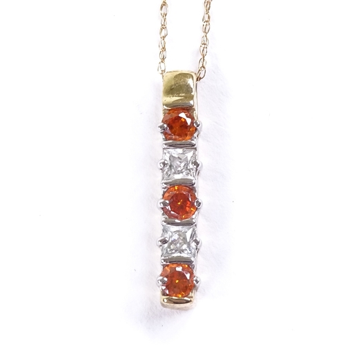 647 - A late 20th century unmarked gold CZ and orange stone line pendant necklace, on 9ct trace link chain... 