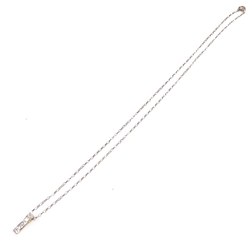 648 - A 9ct gold CZ line pendant necklace, on 9ct trace link chain, pendant height 15.8mm, chain length 50... 