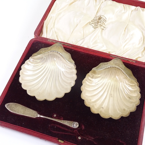 652 - A pair of Edwardian silver shell-shaped butter dishes, with fitted frosted glass inserts and 1 butte... 