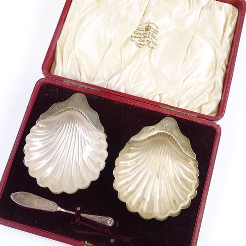 652 - A pair of Edwardian silver shell-shaped butter dishes, with fitted frosted glass inserts and 1 butte... 