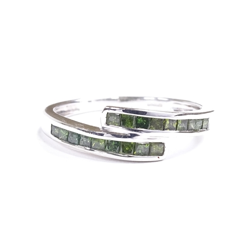 654 - A 9ct white gold Russian diopside crossover dress ring, setting height 5.8mm, size P, 2.5g