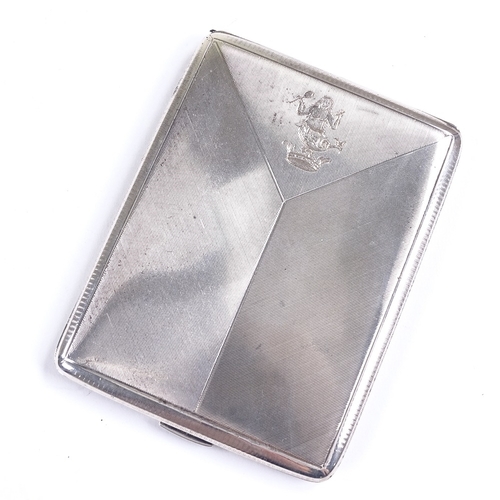 665 - A George V rectangular silver cigarette case, engine turned Czechoslovakian flag decoration with eng... 