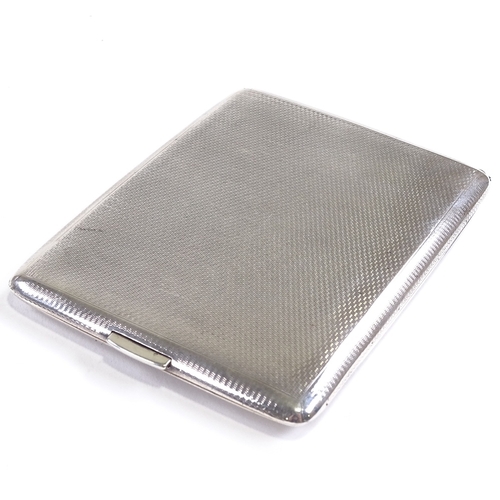 665 - A George V rectangular silver cigarette case, engine turned Czechoslovakian flag decoration with eng... 