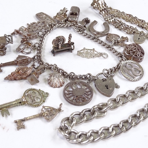 674 - 3 silver charm bracelet and various charms