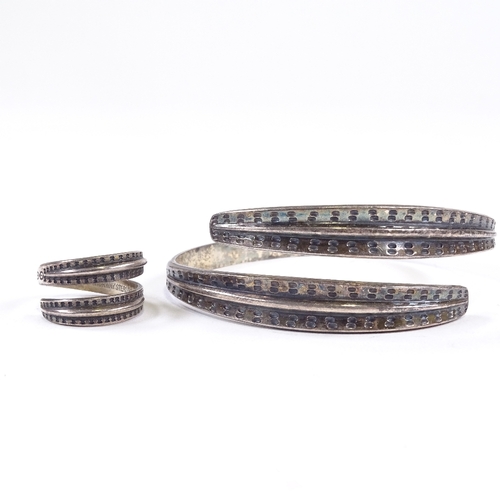 676 - DAVID ANDERSEN - a Vintage Norwegian sterling silver Saga Collection torque bangle and ring, bangle ... 