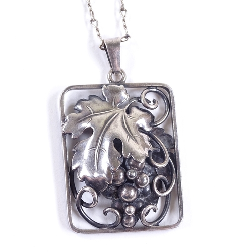 677 - GRANN & LAGLYE - a Vintage Danish stylised silver double-sided grapevine pendant necklace, on Contin... 