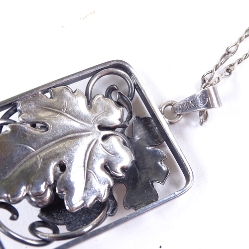 677 - GRANN & LAGLYE - a Vintage Danish stylised silver double-sided grapevine pendant necklace, on Contin... 