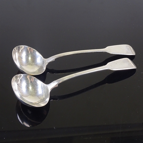 688 - A pair of William IV silver Fiddle pattern sauce ladles, by Mary Chawner, hallmarks London 1836, len... 