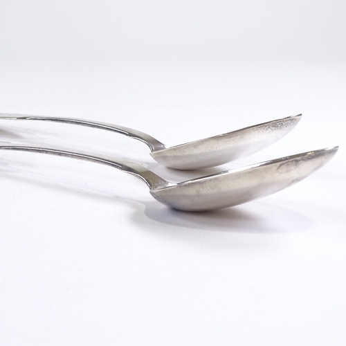 697 - A pair of Victorian silver Fiddle pattern serving spoons, by Robert Williams, hallmarks Exeter 1844,... 