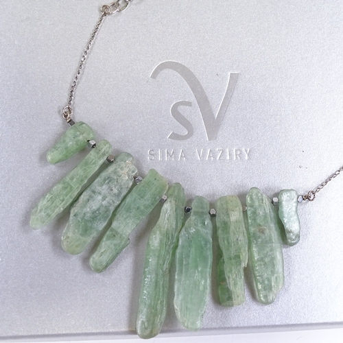 698 - SIMA VAZIRY - a designer graduated green fluorite crystal necklace, on inter-spacing link sterling s... 