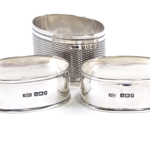 705 - A pair of Edwardian silver napkin rings, by James Dixon & Sons Ltd, hallmarks Sheffield 1907, cased,... 