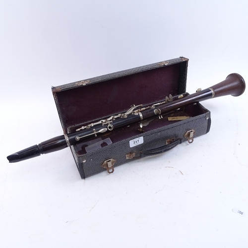 A Vintage Boosey & Hawkes rosewood 77 clarinet, serial no