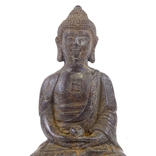 113 - A Chinese patinated bronze seated Buddha, height 18cm