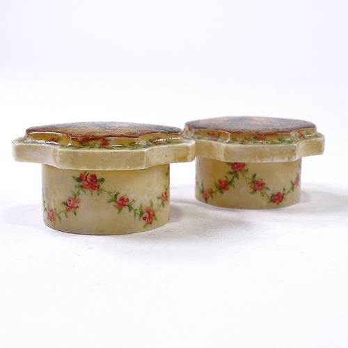 101 - A pair of ivory rouge pots circa 1900, the shaped lids hand painted in the style of Vernis Martin, t... 