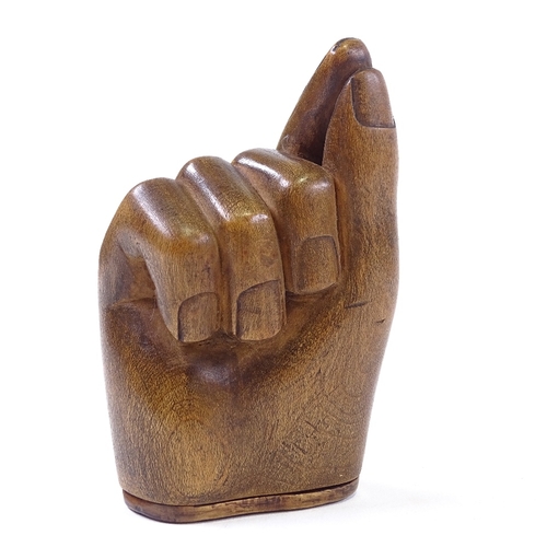 103 - A 19th century carved treen hand-design snuffbox, length 9cm