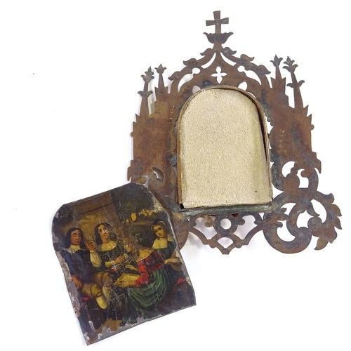 111 - A pierced and engraved brass icon case containing a printed icon, height 16cm, together with a small... 