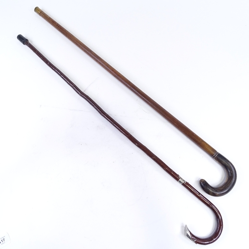 117 - A silver-mounted walking cane, and a horn-handled walking stick (2)