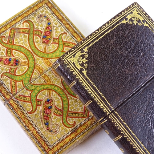 136 - An Indian hand painted and gilded card case, length 9.5cm, and a leather and gilded card case in the... 