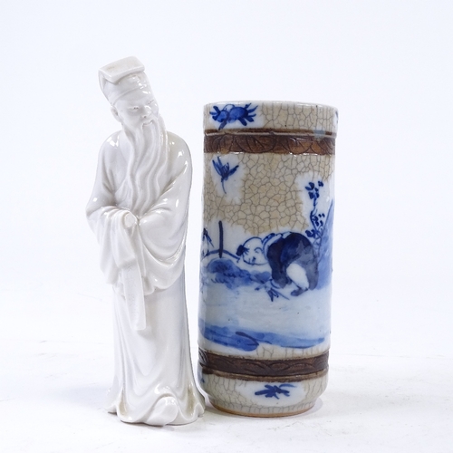 165 - A Chinese blue and white porcelain cylinder vase, height 15cm, and a white glaze porcelain figure of... 