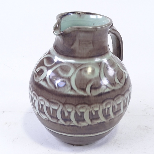 167 - FISHLEY HOLLAND - Studio pottery jug, green/brown glaze, height 23cm