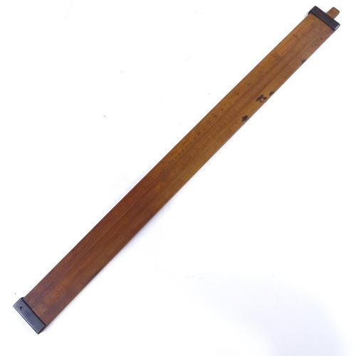 175 - A boxwood and brass-mounted slide rule, by Dring & Fage (1883 - 1902), length 62cm