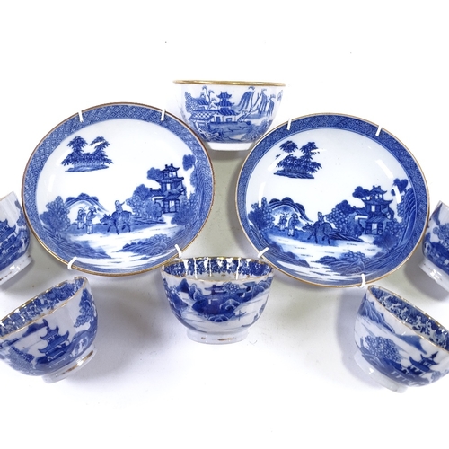 176 - A group of Chinese blue and white porcelain tea bowls and saucers, with gilded decoration (8)