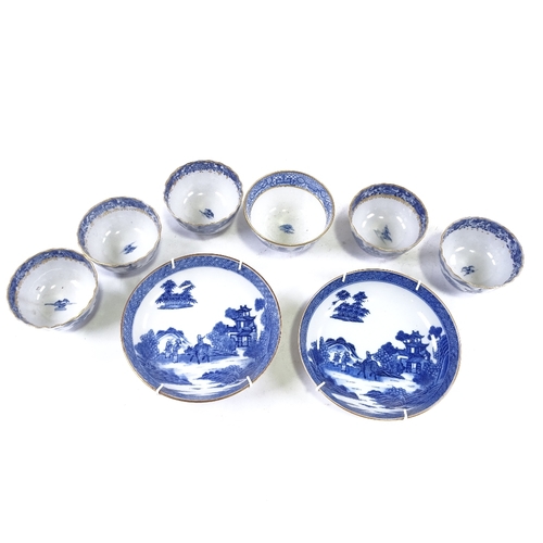 176 - A group of Chinese blue and white porcelain tea bowls and saucers, with gilded decoration (8)