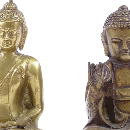 67 - 2 Oriental polished bronze seated deities, largest height 18cm (2)