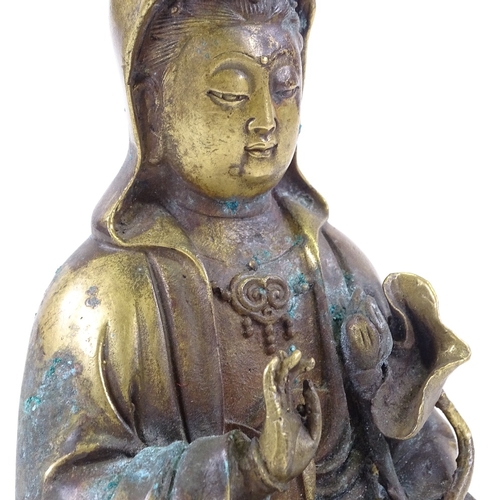 69 - A Chinese polished bronze seated Buddha, height 19cm