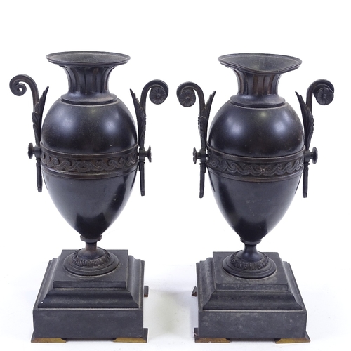 76 - A pair of Victorian bronze-mounted black marble and slate ornamental urns, height 25cm