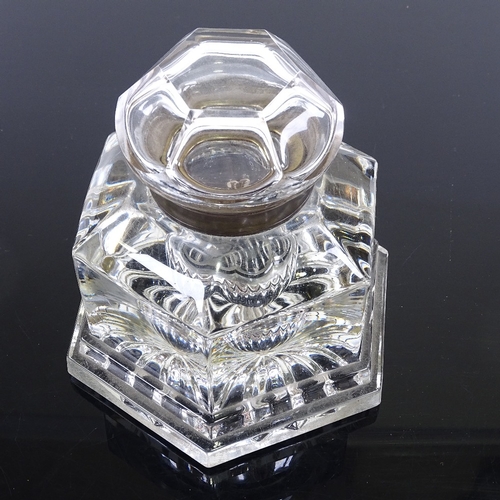 80 - A large and heavy Victorian glass inkwell, brass-mounted hinged top, height 12cm, 11cm across