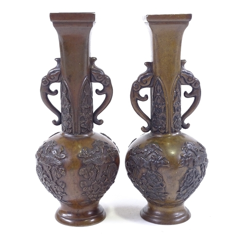 81 - A pair of Japanese patinated bronze 2-handled vases, relief moulded decoration, seal marks under, he... 