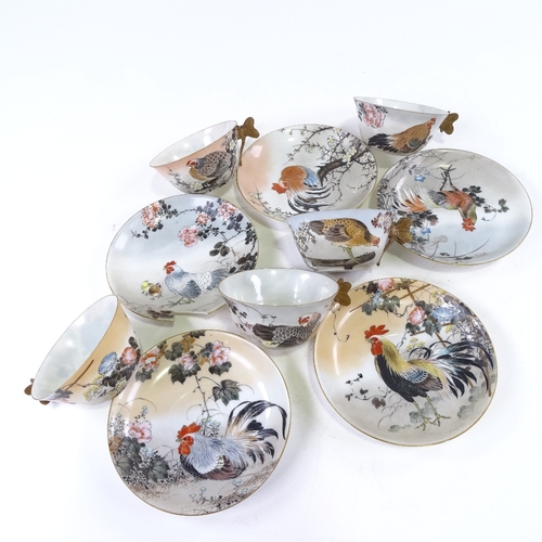 90 - A set of 5 Japanese porcelain cups and saucers, with gilded butterfly handles and painted decoration