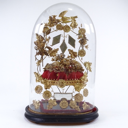 91 - A 19th century French wedding dome, gilt-metal and mirror inset ornament under original glass dome, ... 