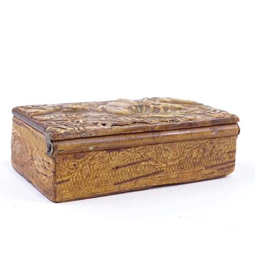 99 - A 19th century Swedish relief carved birch wood snuffbox, depicting a deer hunting scene, length 9cm