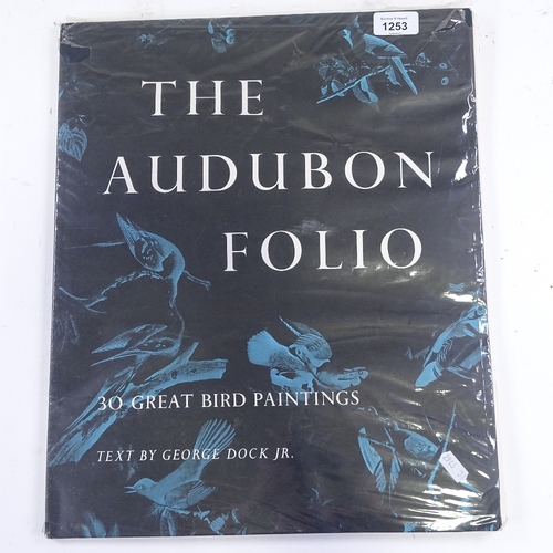 1253 - The Audubon Folio containing 26 unframed ornithology prints, sheet size 17