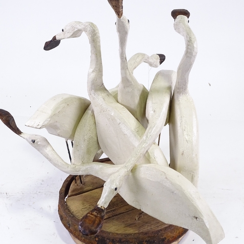 1308 - Clive Fredriksson, painted wood sculpture, group of spoonbill waders on metal-bound barrel type stan... 