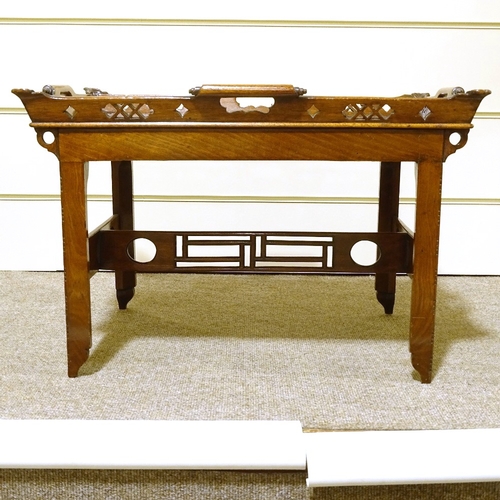 128 - A Victorian mahogany tray-top occasional table, with carved and pierced gallery, and pierced stretch... 