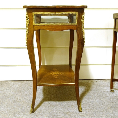 131 - A late 19th century French kingwood and marquetry inlaid display table, with gilt-bronze mouldings a... 