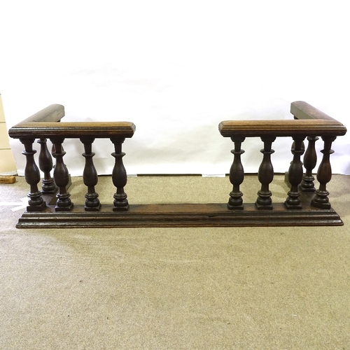 174 - A 19th century oak Club fender with turned balusters, width 1.73m