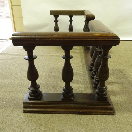 174 - A 19th century oak Club fender with turned balusters, width 1.73m