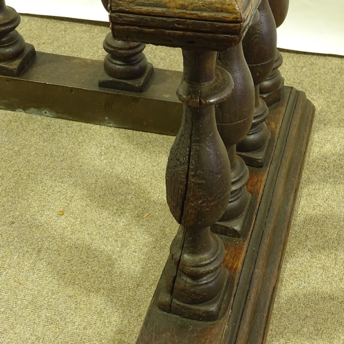 174 - A 19th century oak Club fender with turned balusters, width 1.73m