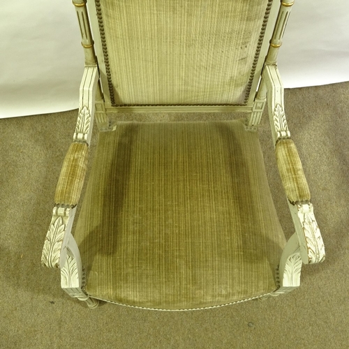 204 - A pair of French carved painted and gilded wood-framed open arm salon chairs