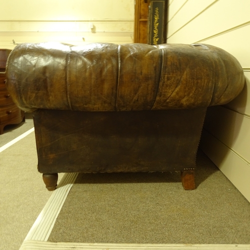 209 - A brown buttoned leather-upholstered 3-seater Club Chesterfield sofa, early 20th century, overall le... 