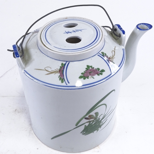 223 - A large Chinese porcelain teapot, hand painted decoration and wire handles, height 24cm, modern